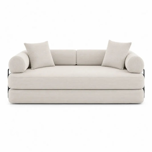 Sofá cama de pana beige con cojines